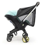Poussette bébé compacte légère avec paresoleil filet ventilation design moderne matériaux durables antiUV couleur turquoise noir
