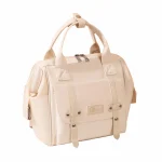 Sac à dos multifonctionnel maternité matériau durable antiéclaboussures sac à couches bébé résistant à l&rsquo;usure design moderne portable beige