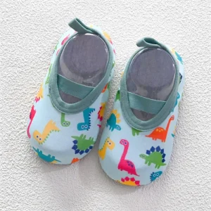 Chaussons bébé antidérapants dinosaures motifs multicolores confort intérieur 01 ans doux sécurité antiglisse