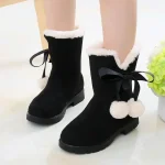 Bottes fille hiver mode suédine fourrure synthétique pompons déco élégance confort sécurité qualité