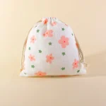 Sac à cordon en mousseline de coton design floral portable rangement polyvalent texture gaufrée idéal pour cosmétiques et accessoires