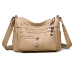 Sac à main beige PU pour femme design épuré sac à bandoulière poches multiples Usage quotidien et voyage Matière douce Style moderne et élégant
