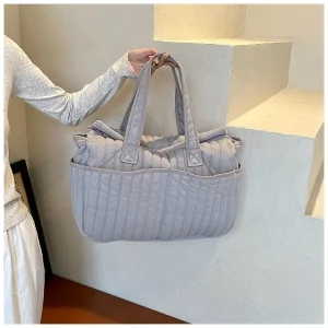 Sac à couches multifonctionnel grande capacité sac de maternité Organizer bébé sac de voyage porté épaule ou main style moderne minimaliste texture côtelée couleur grise