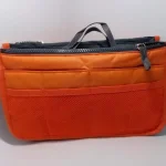 Trousse de rangement multifonctionnelle portable à double fermeture éclair sac de cosmétiques grande capacité poignées intégrées style moderne orange vif idéal pour maman voyageuse