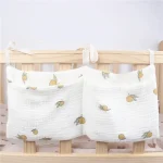 Organisateur de lit bébé suspendu Sac de rangement double poche Mousseline imprimée citron Accessoires nouveauné Design mignon et pratique Idéal pour chambre bébé