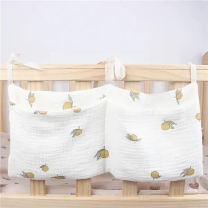 Organisateur de lit bébé suspendu Sac de rangement double poche Mousseline imprimée citron Accessoires nouveauné Design mignon et pratique Idéal pour chambre bébé Organisateur de lit bébé suspendu Sac de rangement double poche Mousseline imprimée citron Accessoires nouveauné Design mignon et pratique Idéal pour chambre bébé