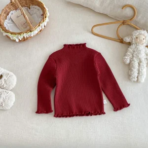Pull à manches longues pour bébé fille style princesse tissu doux couleur rouge bordeaux confort et élégance pour les jeunes enfants