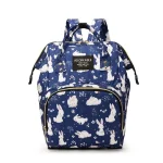 Sac à dos à couches pour bébé sac de transport poussette style enfantin motifs lapins fleurs maternité design moderne pratique durable