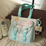 Sac d&rsquo;école style japonais kawaii pour filles en nylon sac à dos et bandoulière design étoiles et pendentif