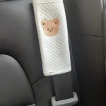 Coussin de sécurité pour ceinture de voiture protecteur antifrottement motif ours blanc confort bébé usage quotidien protection épaules et cou