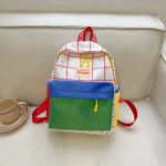 Sac à dos enfants design coloré imperméable grand compartiment bretelles ajustables sac école loisirs style moderne motif carrés multicolore message inspirant