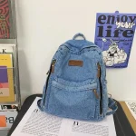 Sac à dos denim bleu clair style moderne pour étudiants urbains sac à dos tendance zippé poches multiples