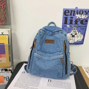 Sac à dos denim bleu clair style moderne pour étudiants urbains sac à dos tendance zippé poches multiples