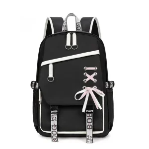 Sac d&rsquo;école moderne à dos avec bandoulière en nylon design épuré fermeture éclair poche avant couleurs noire et rose pour adolescents filles garçons