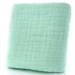 Couverture en mousseline pour bébé douce et respirante serviette de bain légère idéale pour la promenade le change et la maison en vert menthe rose ou blanc design minimaliste 105x105cm