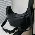 Sac à bandoulière noir minimaliste en nylon polyester fermeture éclair style urbain portable compact