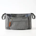 Organisateur de rangement pour poussette bébé sac de voyage polyester résistant style moderne idéal pour les mamans portefeuille intégré poches zippées gris chiné